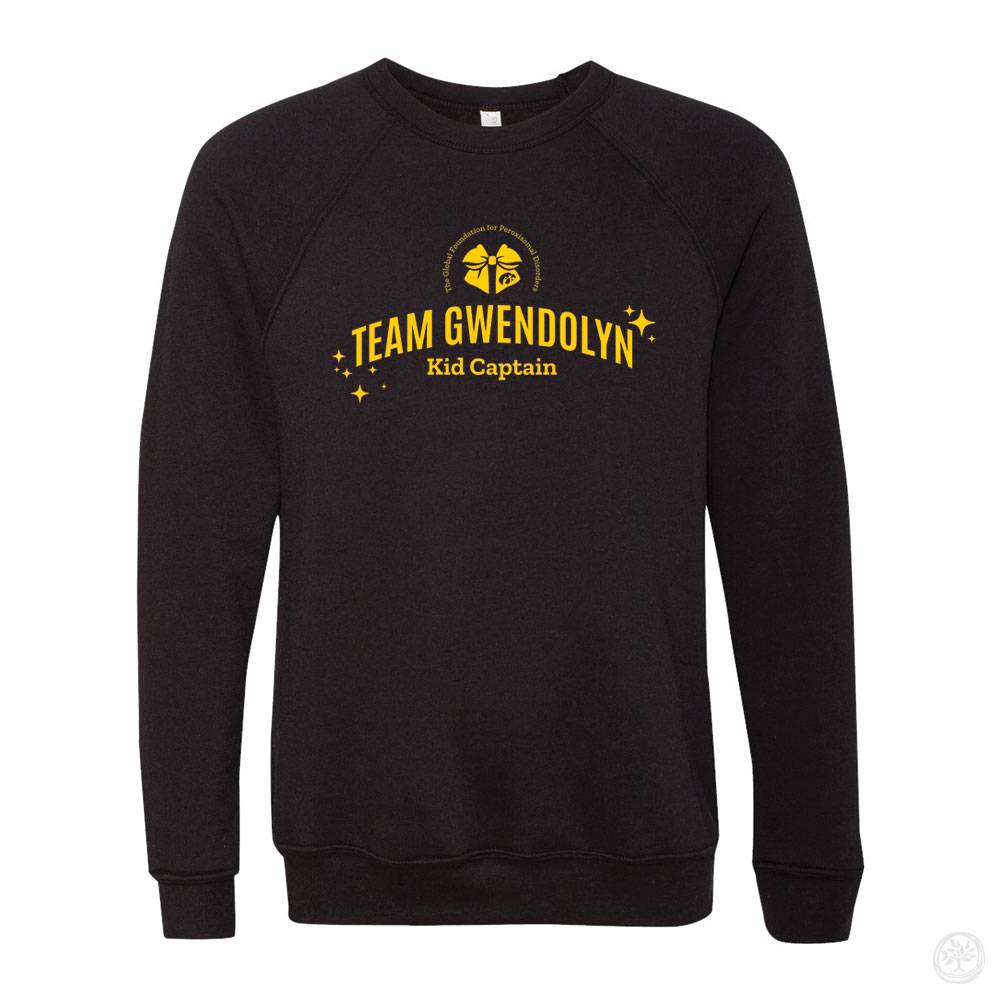 Black crewneck sweatshirt with yellow text reading ‘Team Gwendolyn Kid Captain’ and a circular logo above, accented with small yellow stars.