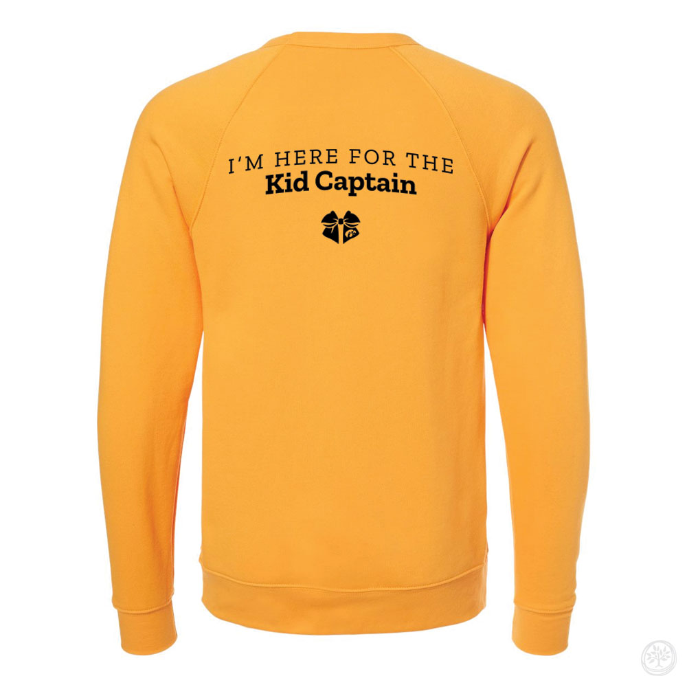 Back view of a black crewneck sweatshirt with yellow text reading ‘I’m Here for the Kid Captain’ and a small Kid Captain logo beneath it.