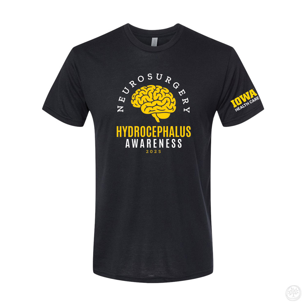 Black short-sleeve t-shirt with a yellow brain graphic and the words 'Neurosurgery Hydrocephalus Awareness 2025' printed on the front. The sleeve features the Iowa Health Care logo in yellow and white.
